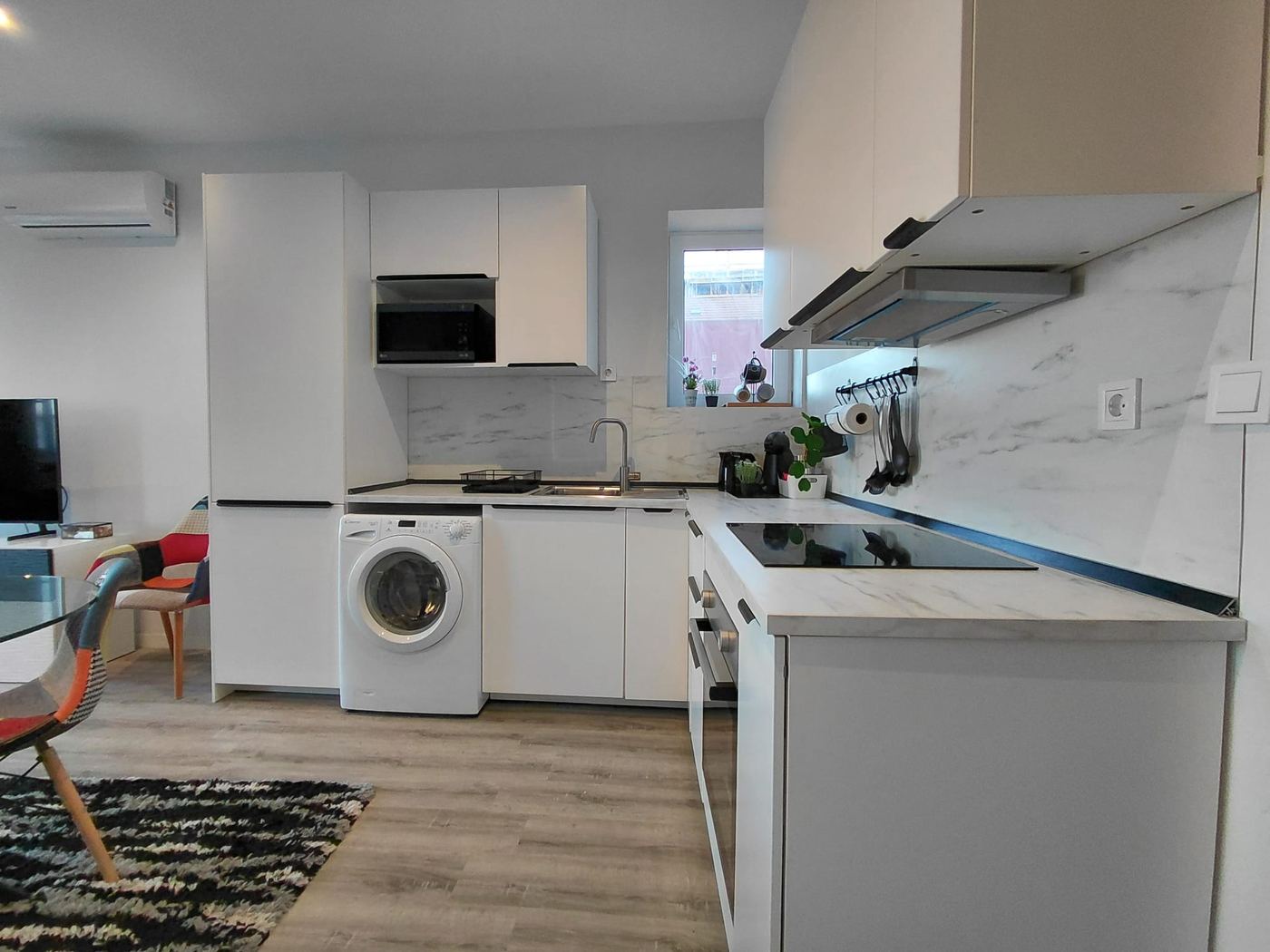 Kitchen detail, connected to the dining area and living room